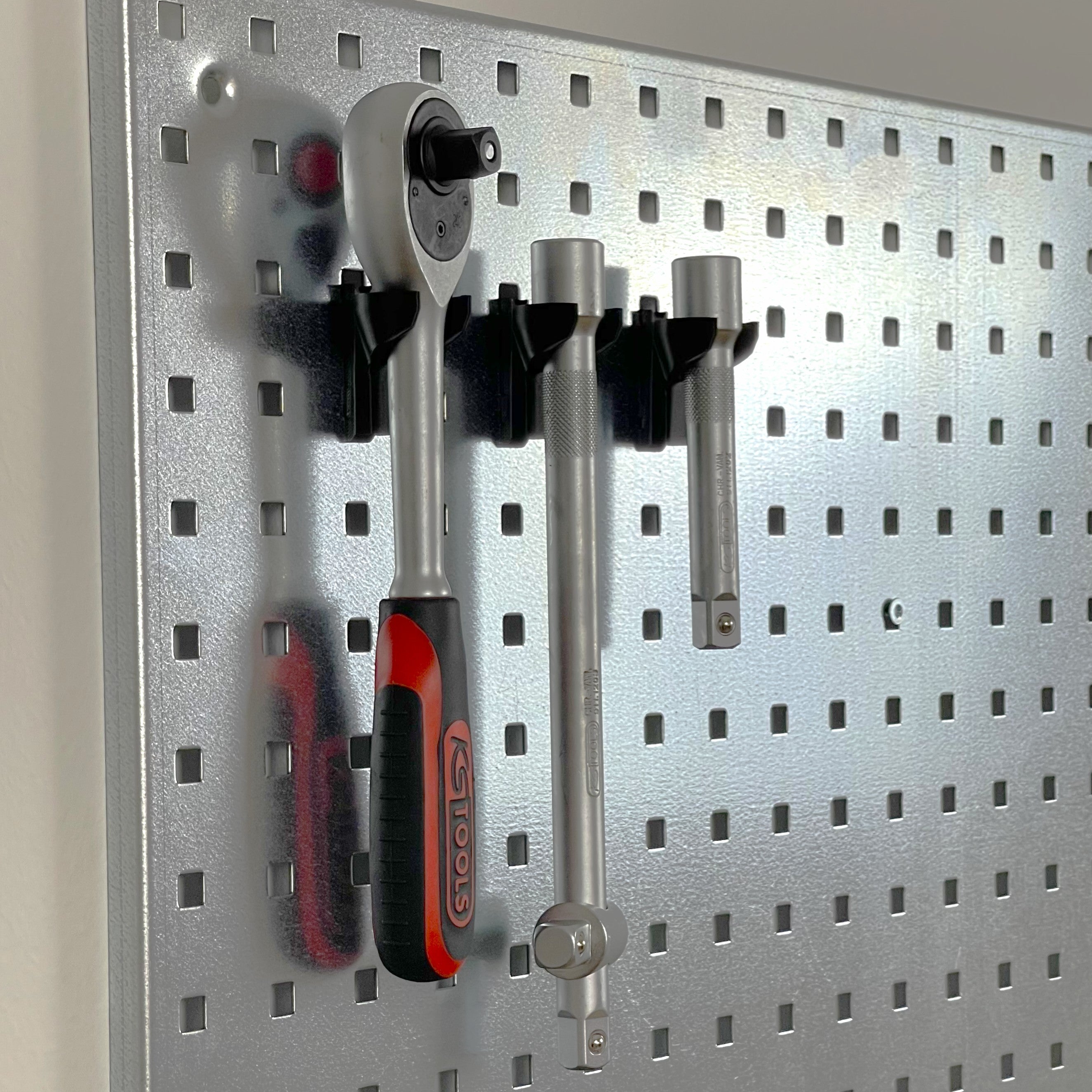 Extension/key holder for tool boards