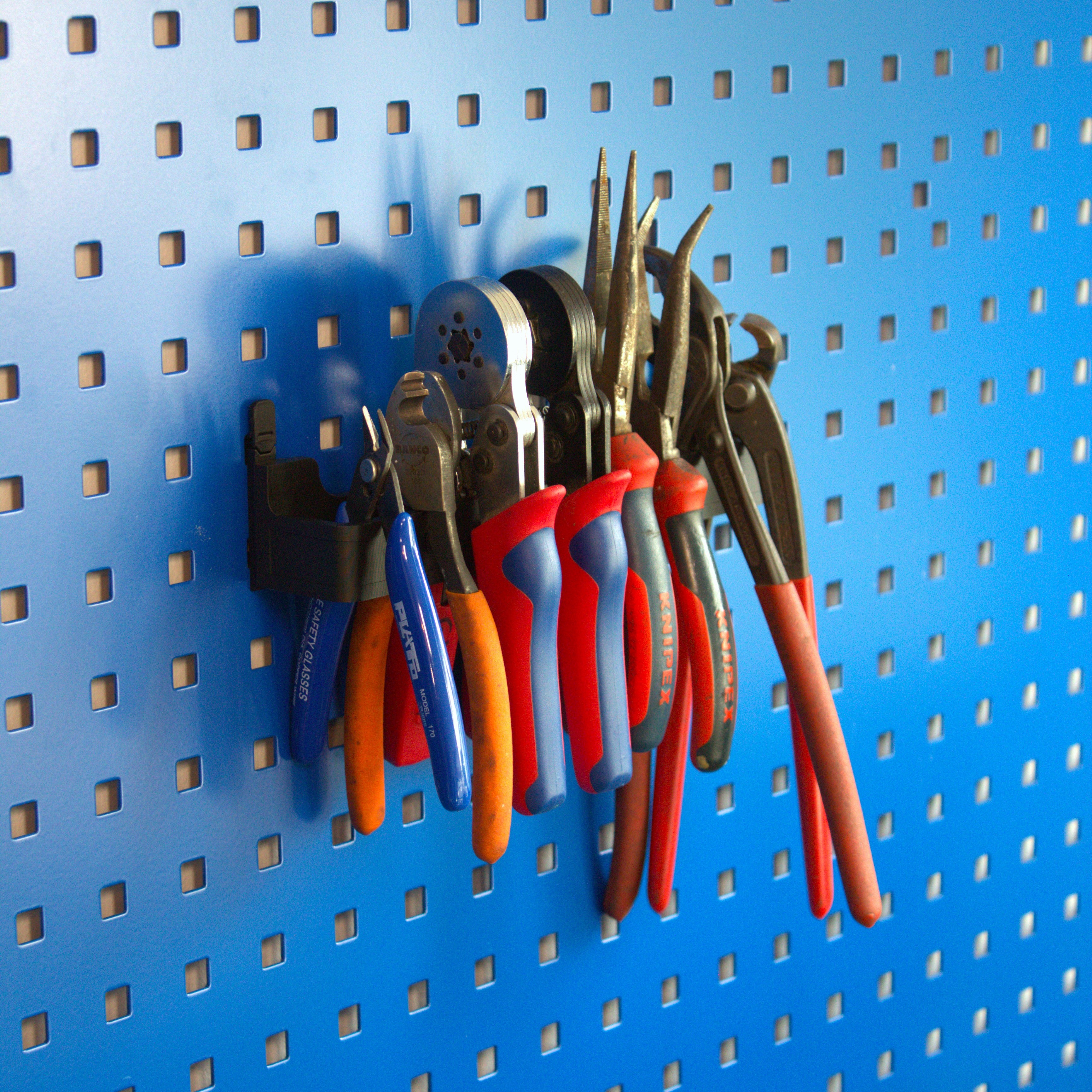 Pliers holders for tool boards