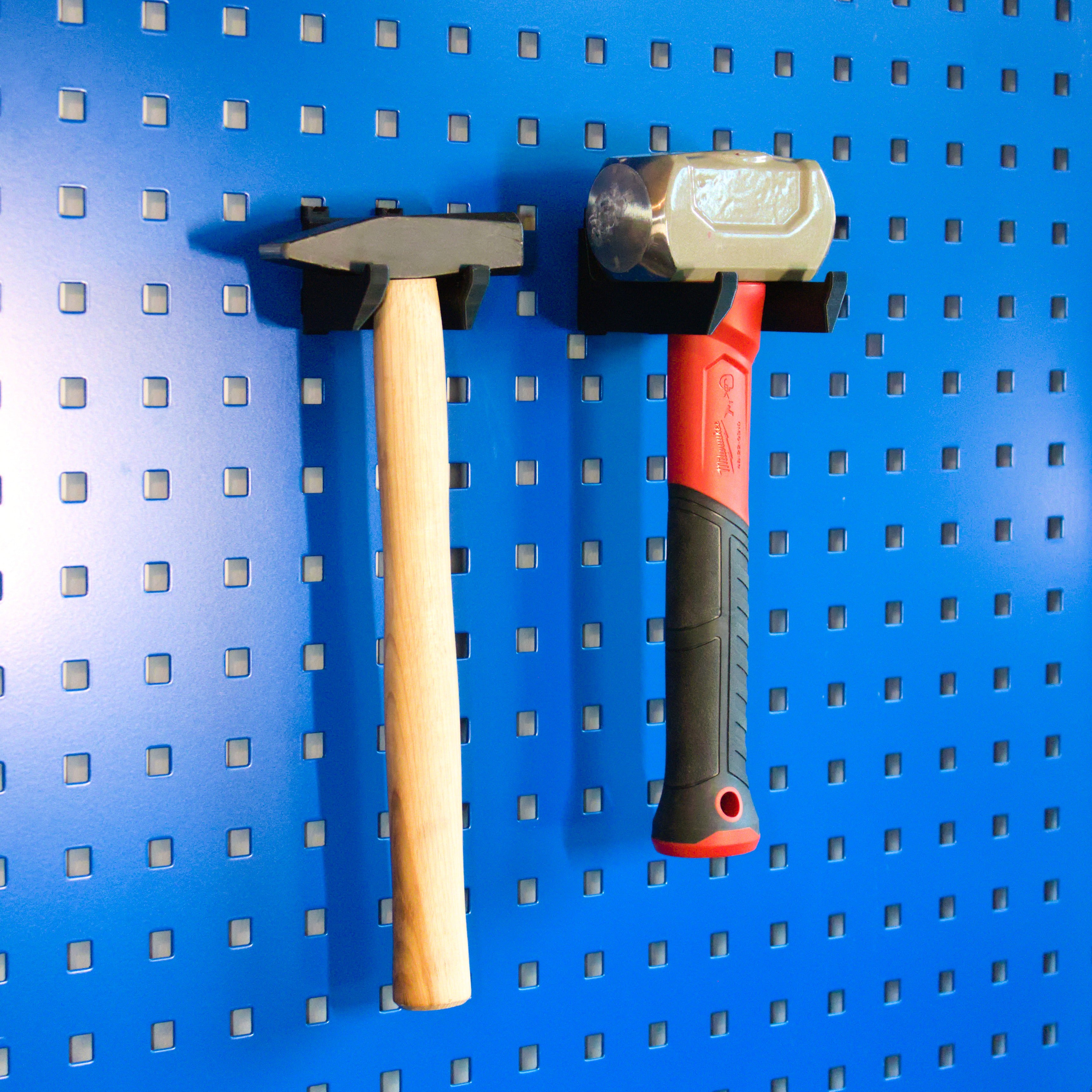 Hammer holder for tool boards